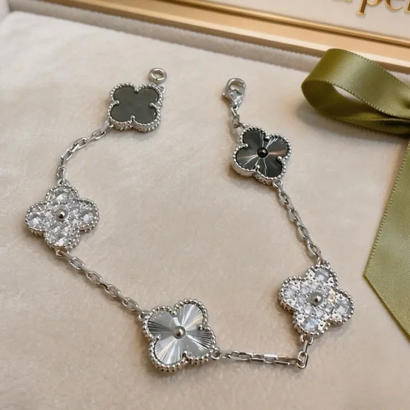 Van Cleef & Arpels Silver and Black Floral Bracelet